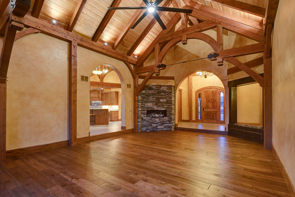 Colorado-Springs-Timber-Home-Canadian-Timberframes-Great-Room-Fireplace