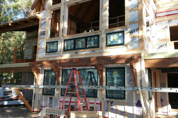 Meredith-Bay-New-Hampshire-Canadian-Timberframes-Construction-Great-Room-windows
