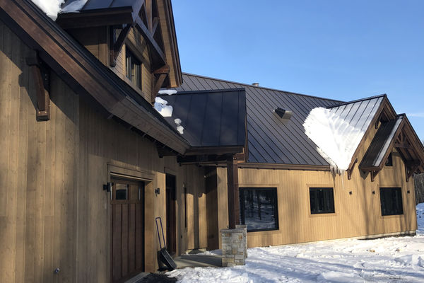 Bromont-Timber-Frame-Home-Quebec-Canadian-Timberframes-Completed-Front-Exterior