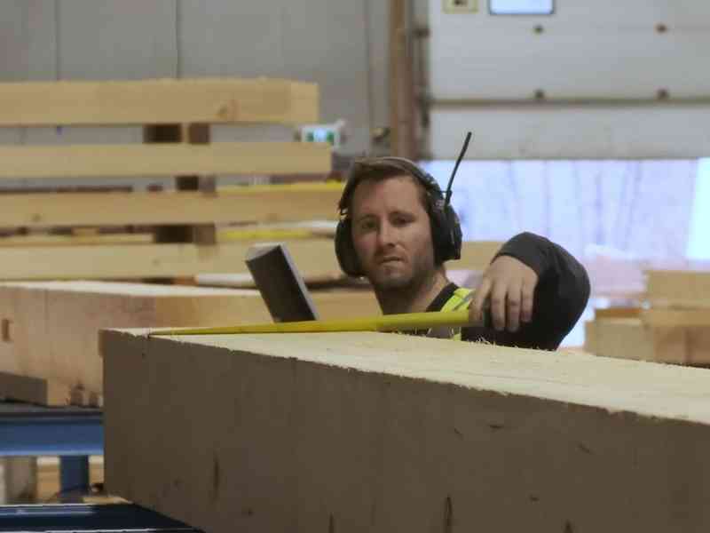 Matt measuring timber at Hundeggar.jpg
