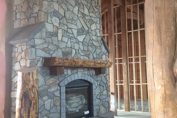 Rustic-River-Calgary-Alberta-Canadian-Timberframes-construction-fire-place
